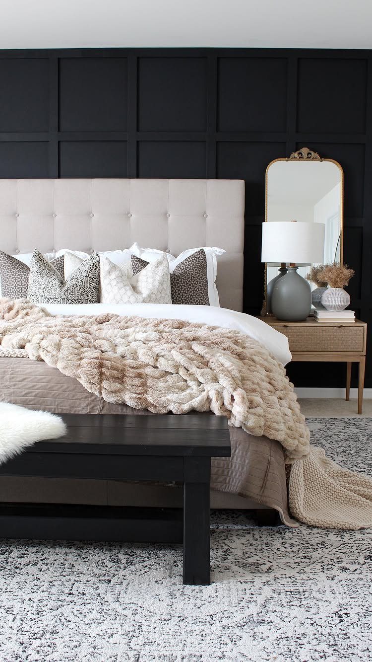 Master Bedroom Interior Design: 16 Ideas for a Better Space 14 Bed with beige headboard against a black grid-patterned wall paneling in a bedroom.