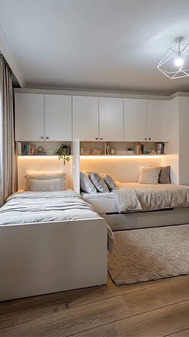 8 Ideas for a Bedroom with 2 Beds That Save Space 7 Two single beds with white linens in a modern bedroom with white cabinetry.