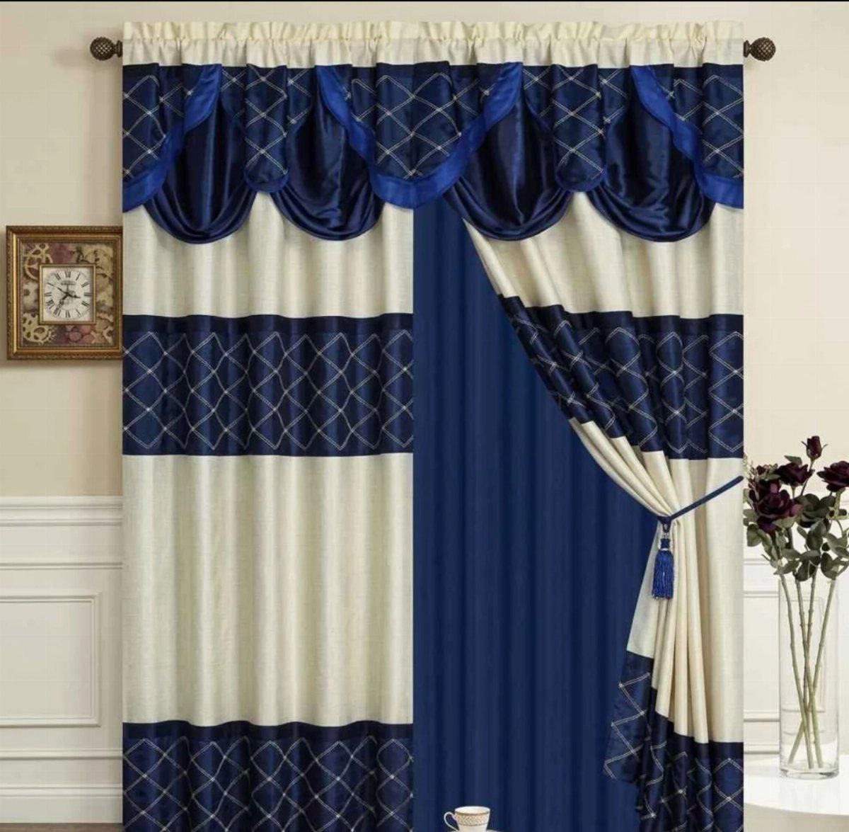 12 Blue White Living Room Ideas with Photos and Styling Tips 10 Blue and white curtains with a scalloped valance and diamond patterns in a room.
