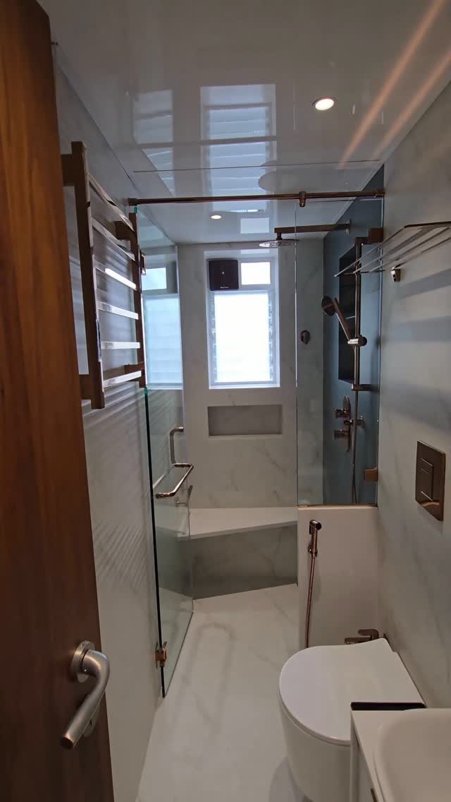 Bathroom Alcove Ideas: 29 Designs for Tubs, Showers & More 3 White bathroom with a bathtub, glass partition, and a small built-in wall niche.