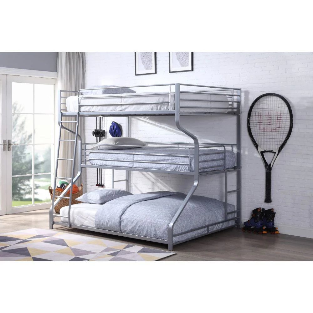 12 Space Saving Furniture Ideas That Actually Work 9 Triple bunk bed with grey metal frames and blue bedding in a bright room.