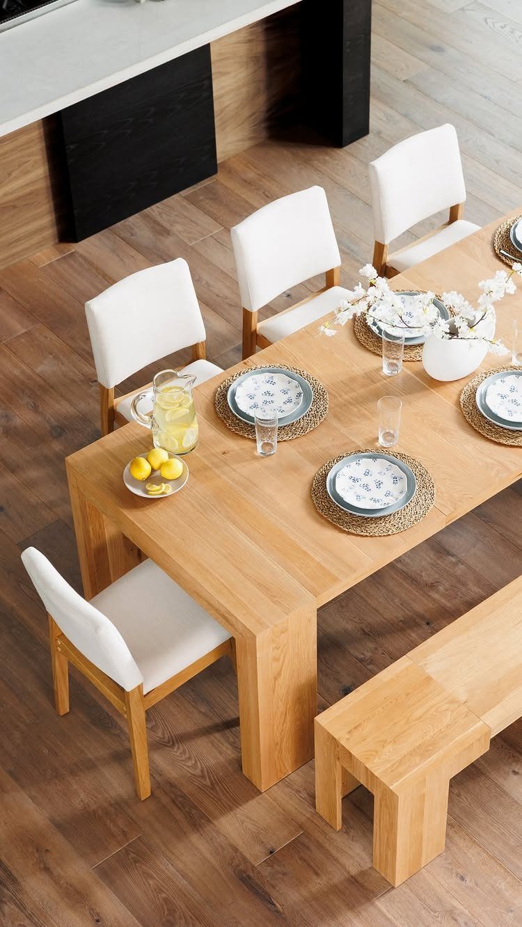 Contemporary Dining Sets in 12 Styles for Your Space 6 Wooden rectangular dining table with white chairs and a matching wooden bench.