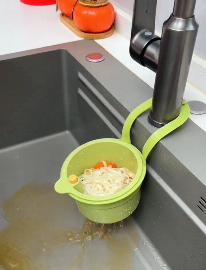 Small Kitchen Essentials: 13 Tools That Actually Matter 13 Lime green colander attached to a black faucet containing cooked noodles and carrots.