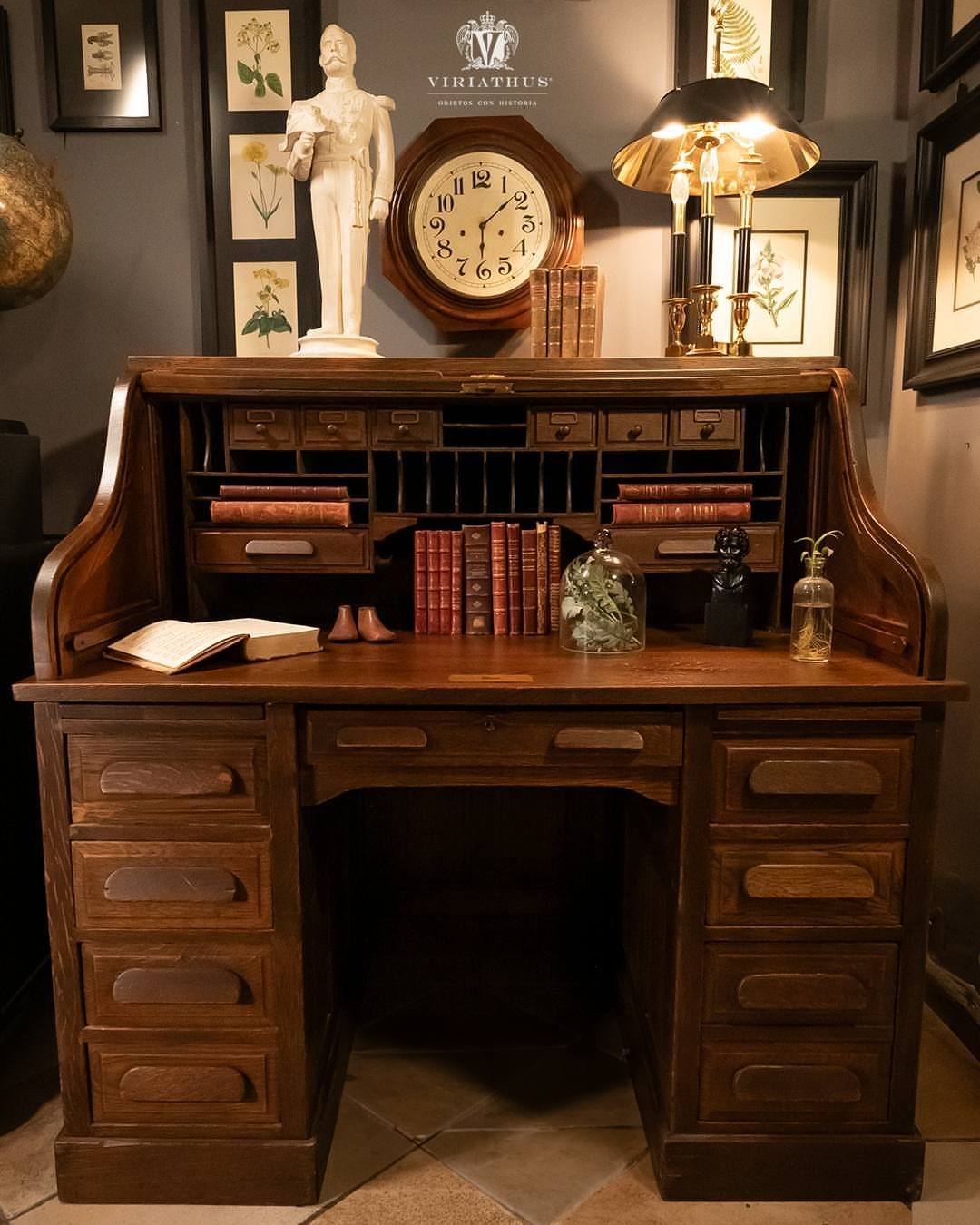 Vintage wooden secretary desk with a hutch and a central open kneehole space.