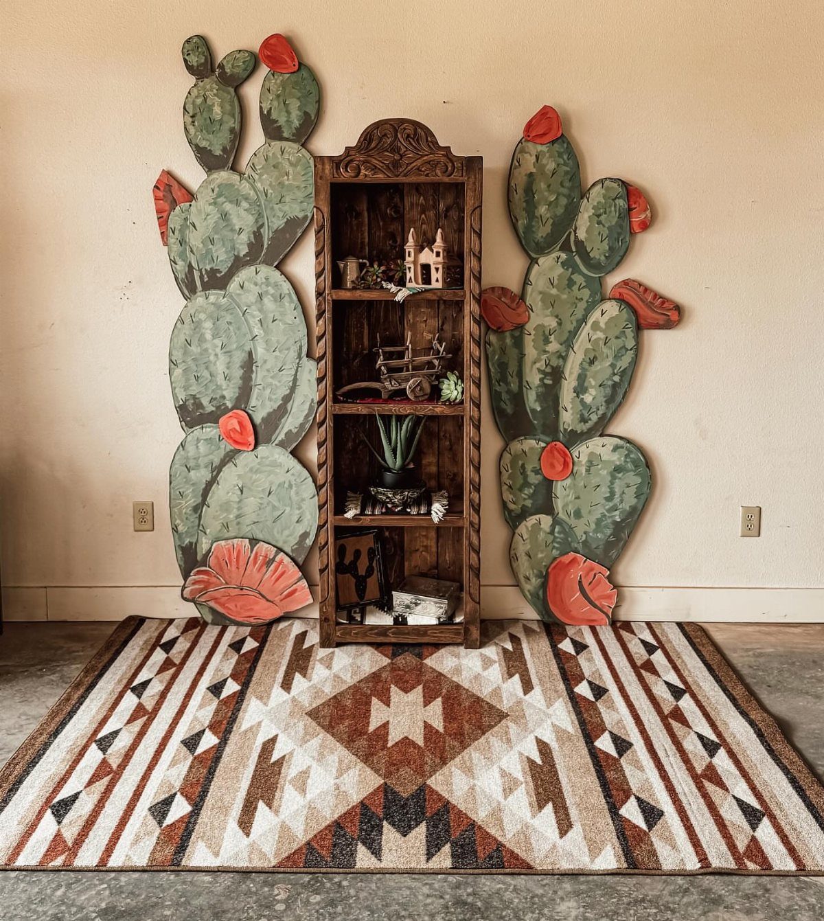 Wood Art Furniture: 31 Ideas From Rustic to Sculptural Forms 28 Wooden bookshelf and cactus sculptures on a geometric Southwestern patterned rug.