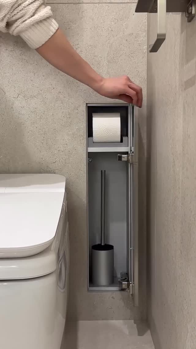 Bathroom Alcove Ideas: 29 Designs for Tubs, Showers & More 24 Built-in bathroom wall alcove holding toilet paper and a toilet brush next to toilet.